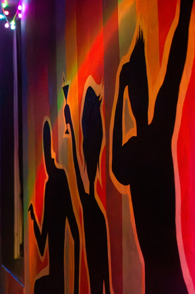 Colourful music mural inside Benjys